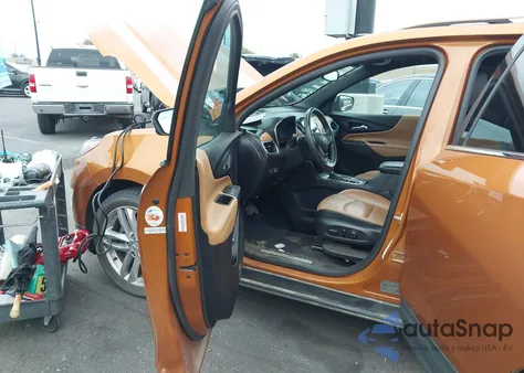 2018 Chevrolet Equinox Premier z USA, uszkodzony, nr VIN 2GNAXMEV6J6201218